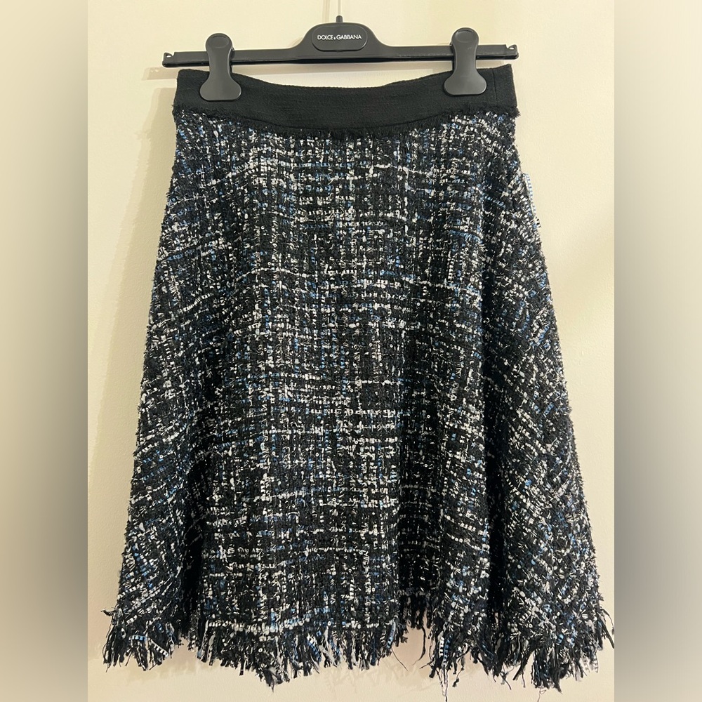 Tweed skirt with raw hem finish
